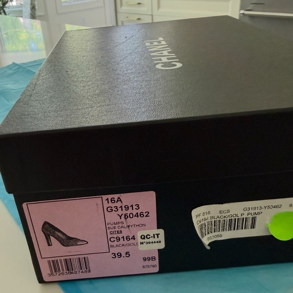 CHANEL Black Quilted Flats with Silver Cap-Toe - Picture 6 of 6
